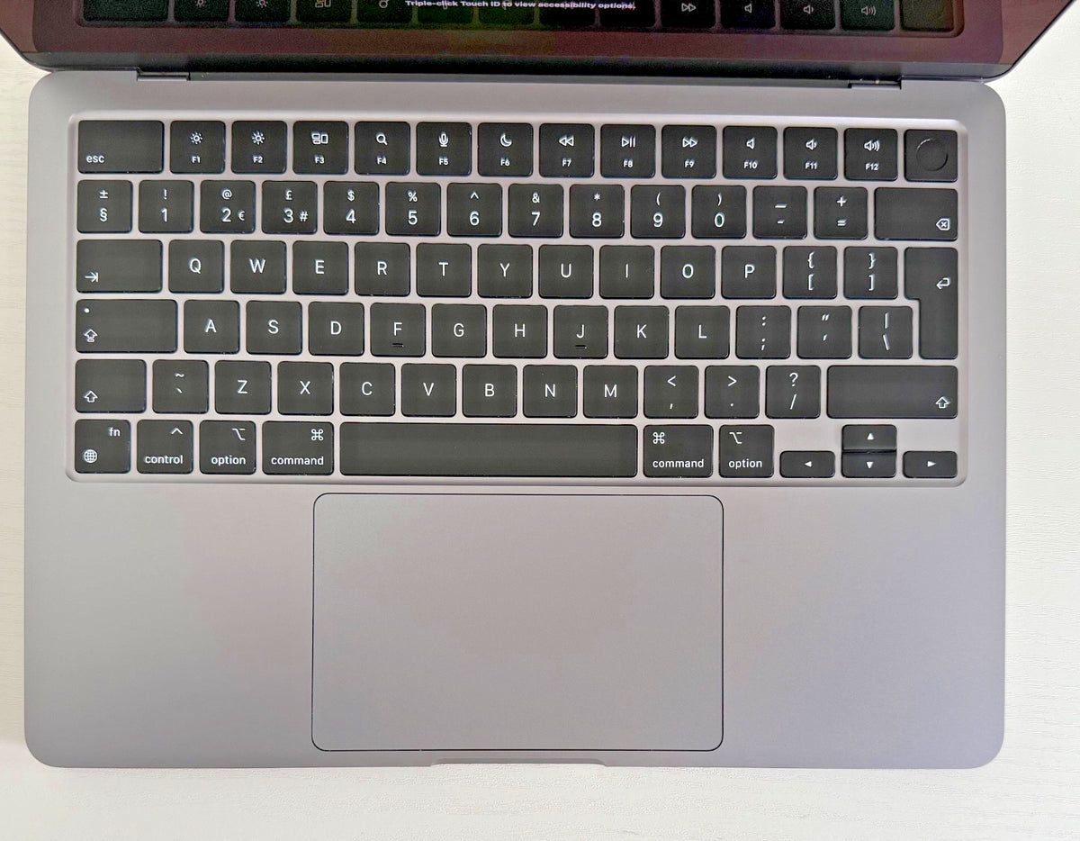 Apple MacBook Air 13-inch M2 Chip 512GB Space Gray refurbished and Phone check Certified laptop with Retina display and backlit keyboard.