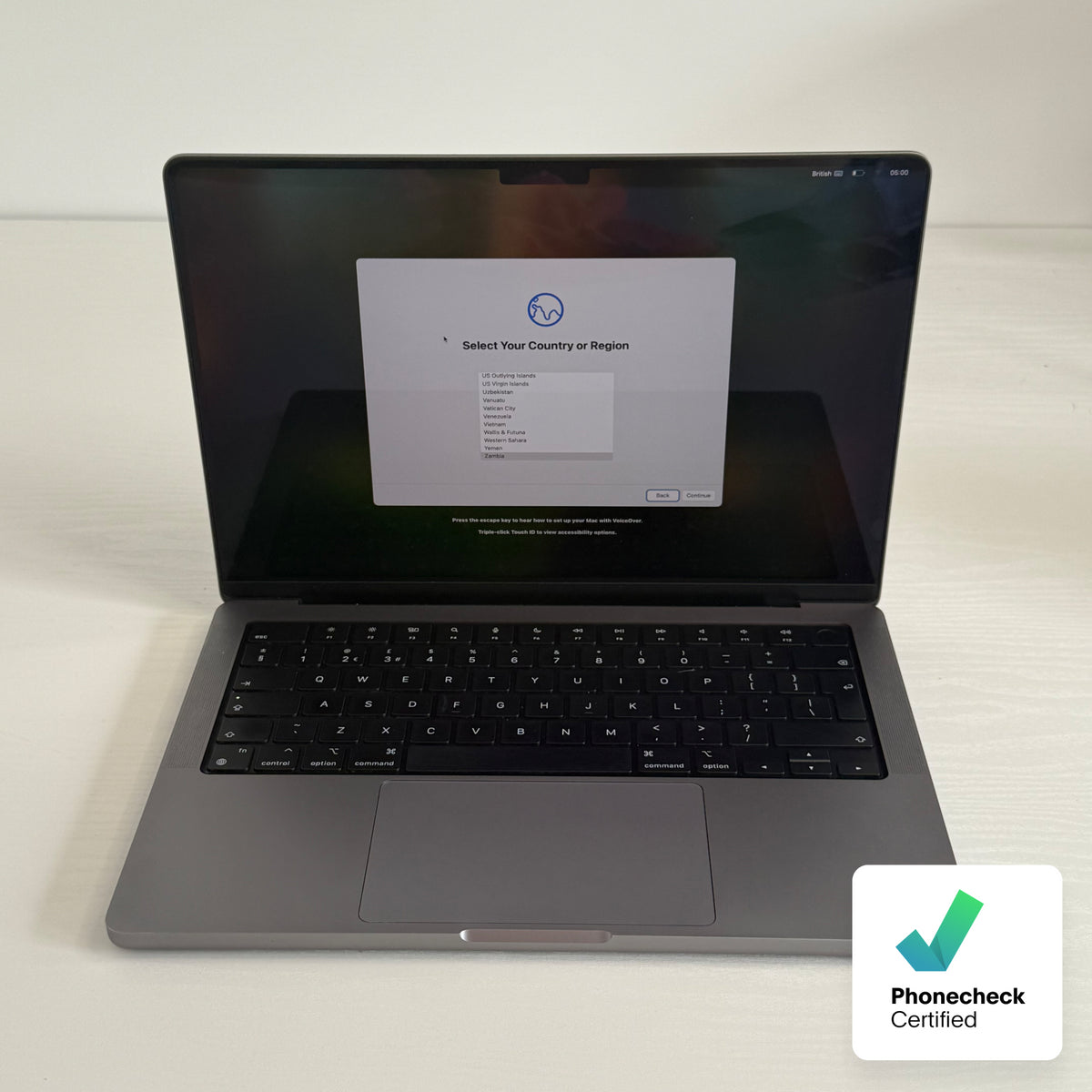 Apple MacBook Pro 14-inch (2021) M1 Pro 10-Core CPU 16-Core GPU 16GB RAM 1TB SSD Space Gray — refurbished Grade B and Phone check Certified laptop with Liquid Retina XDR display shown during setup